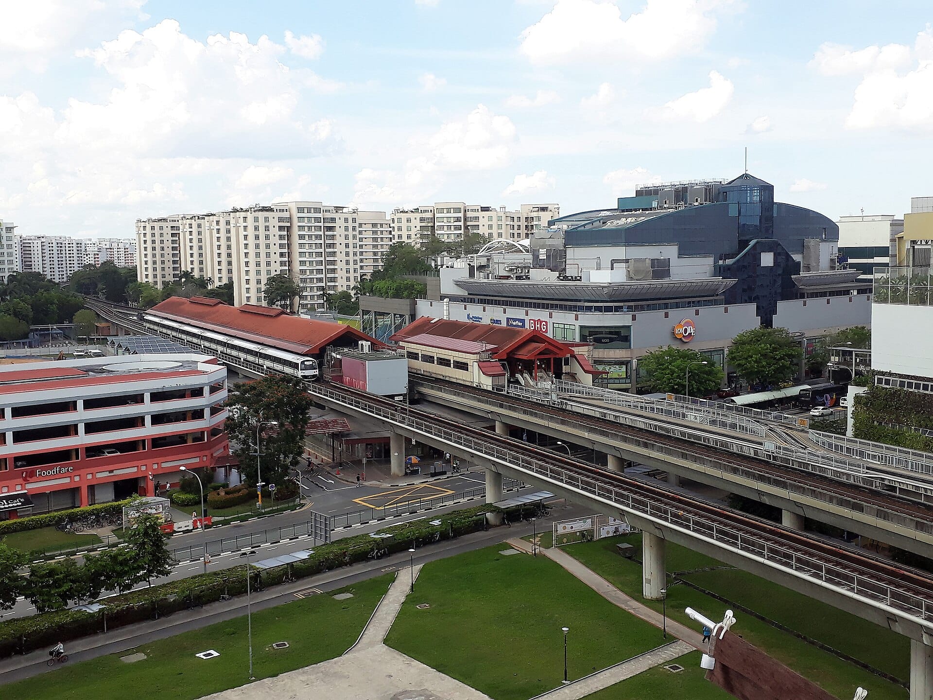 Text "Choa Chu Kang & Lim Chu Kang" and "Start Your Journey" next to a photo of a train station and city buildings.